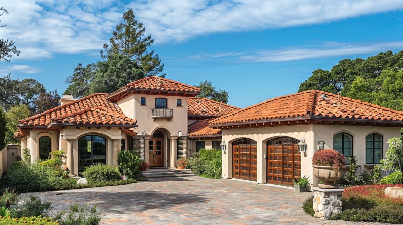 Mediterranean-style home featuring terracotta barrel metal tiles installed by a Sunnyvale, CA metal roofing specialist.