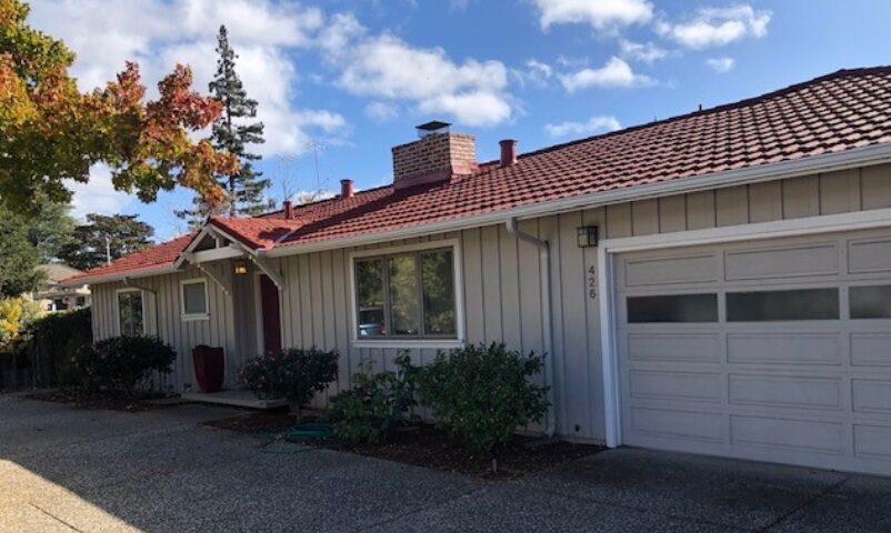 Sunnyvale, CA metal roofing contractors installing a red metal roof
